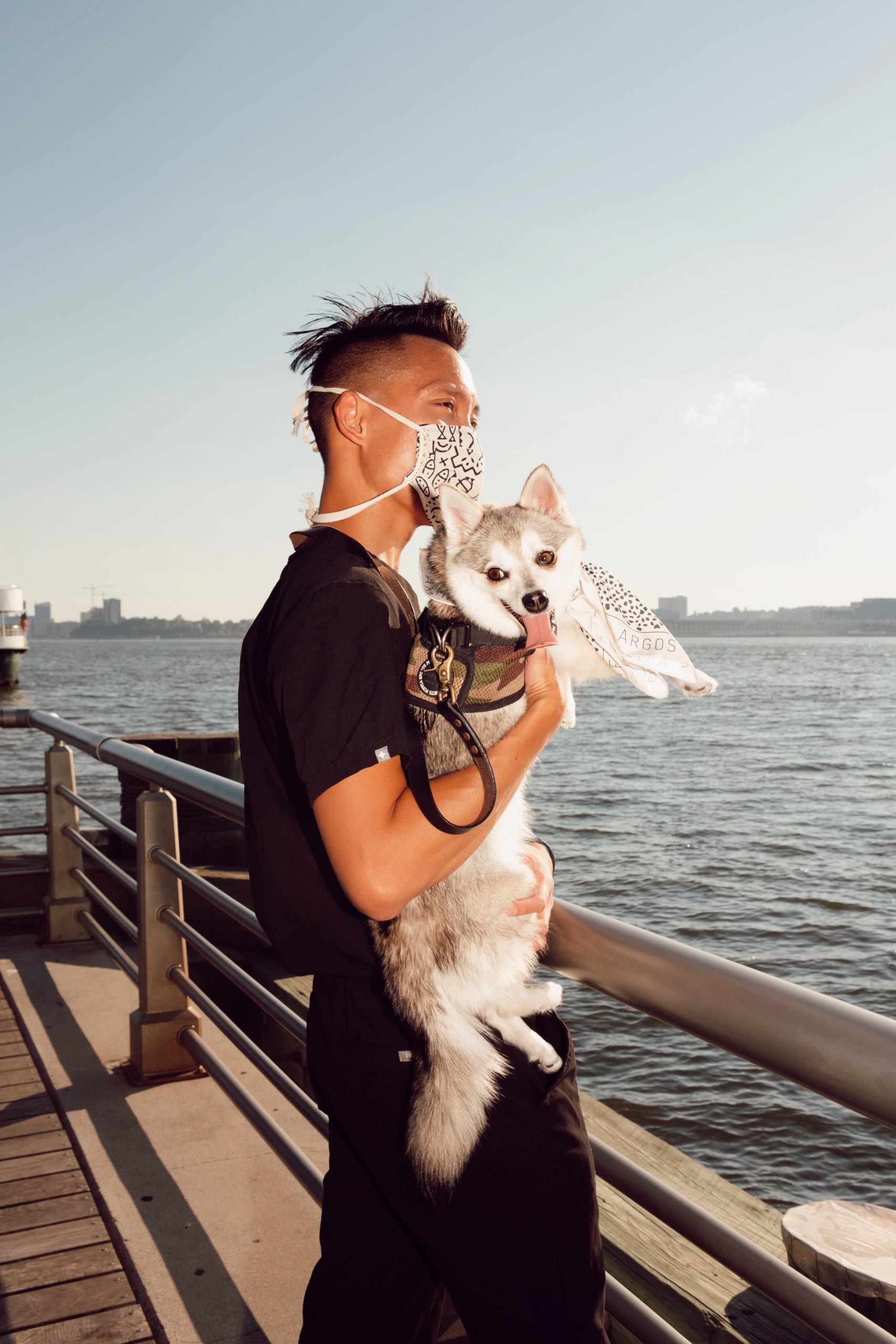 Andy Nguyen, MD, and Dasher the Klee Kai, photographed by Tayler Smith.