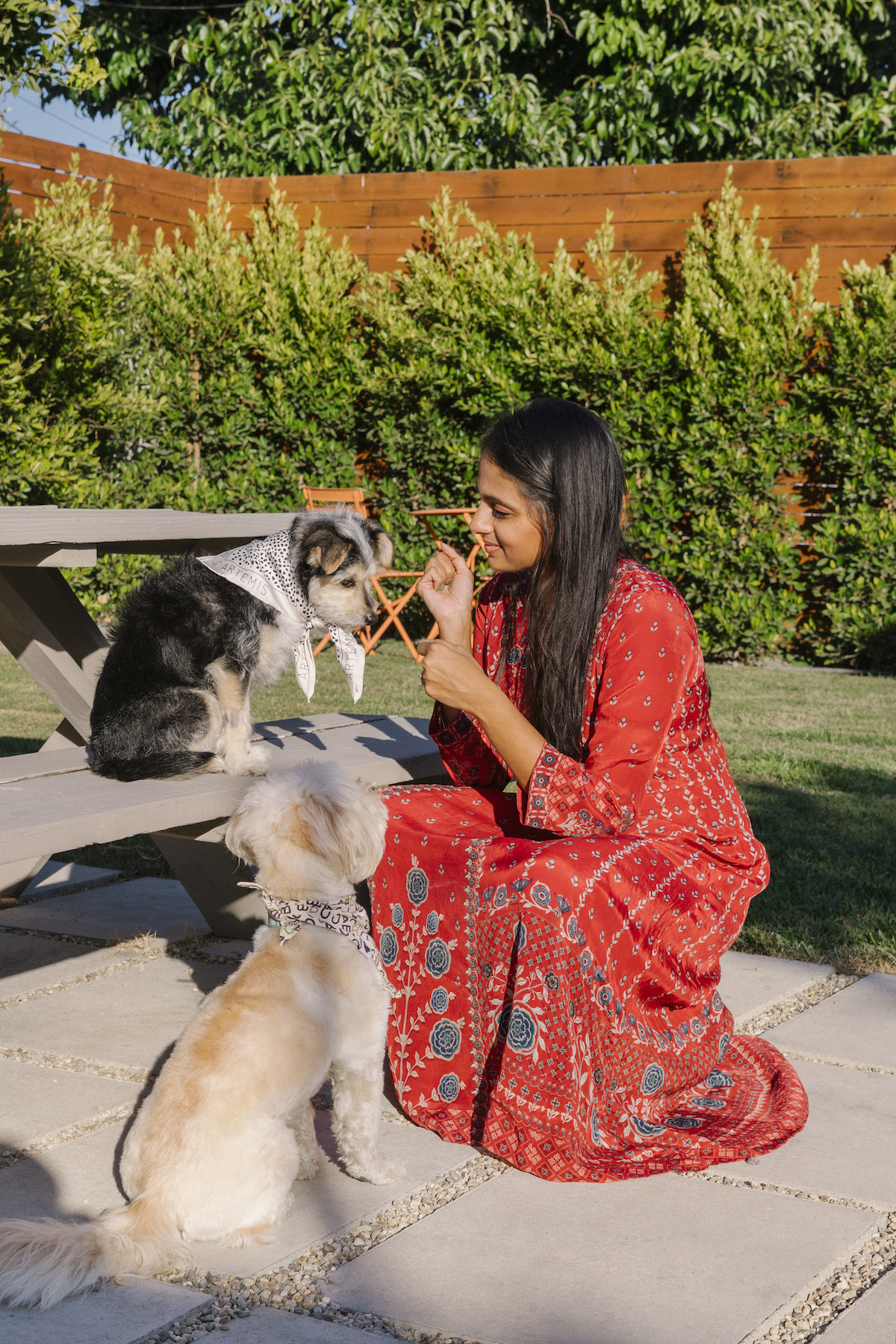Aishwarya Iyer, Founder & CEO of Brightland, at home with her two dogs, photographed by Hannah Choi for Argos & Artemis.