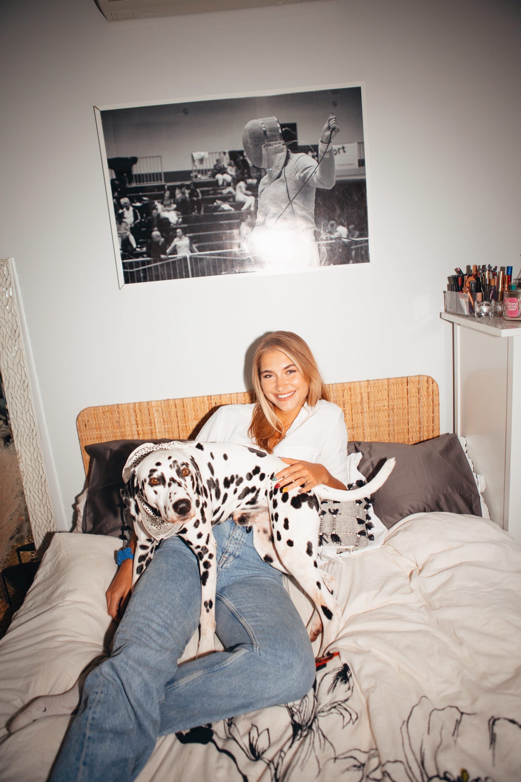 Olympic saber fencer, Monika Aksamit, and Pongo the Dalmatian, photographed for Argos & Artemis by Tayler Smith.