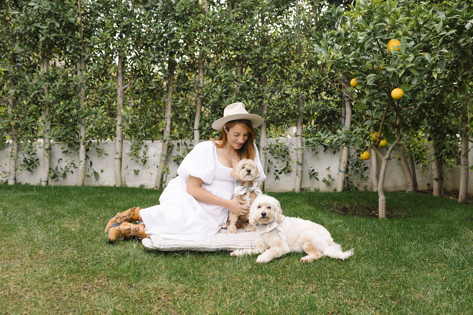 West-Bourne chef and restauranteur Camilla Marcus and her Cockapoo dogs, Teddy and Charlie.